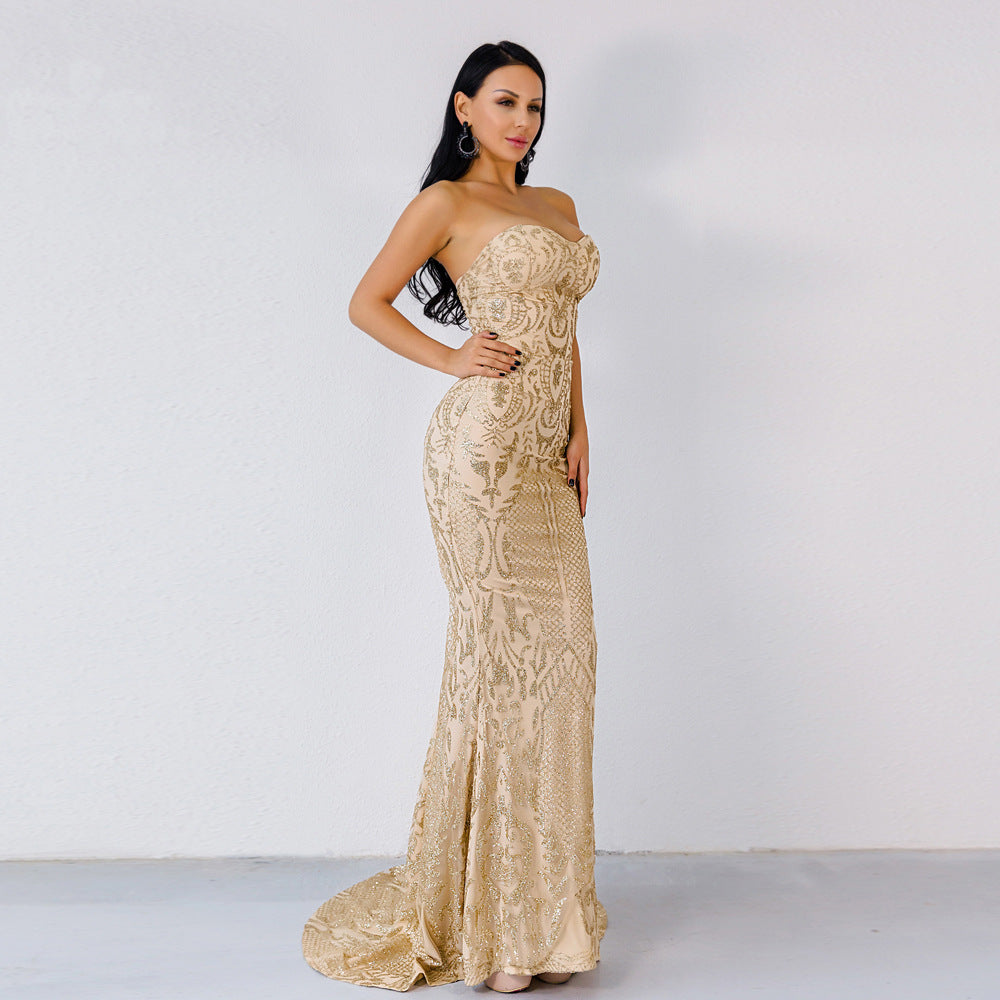 Golden goddess in the Mona Gold Glitter Maxi Dress