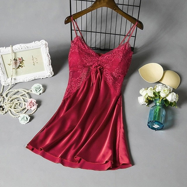 a woman's red dress and accessories on a hanger